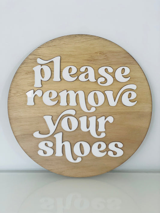 Please remove your shoes sign