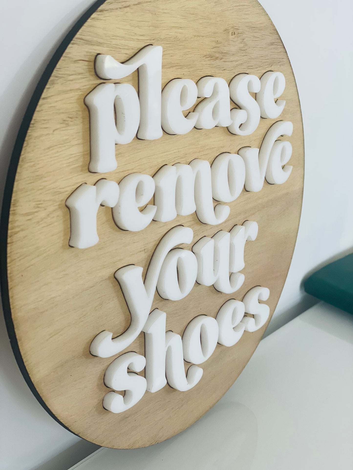 Please remove your shoes sign